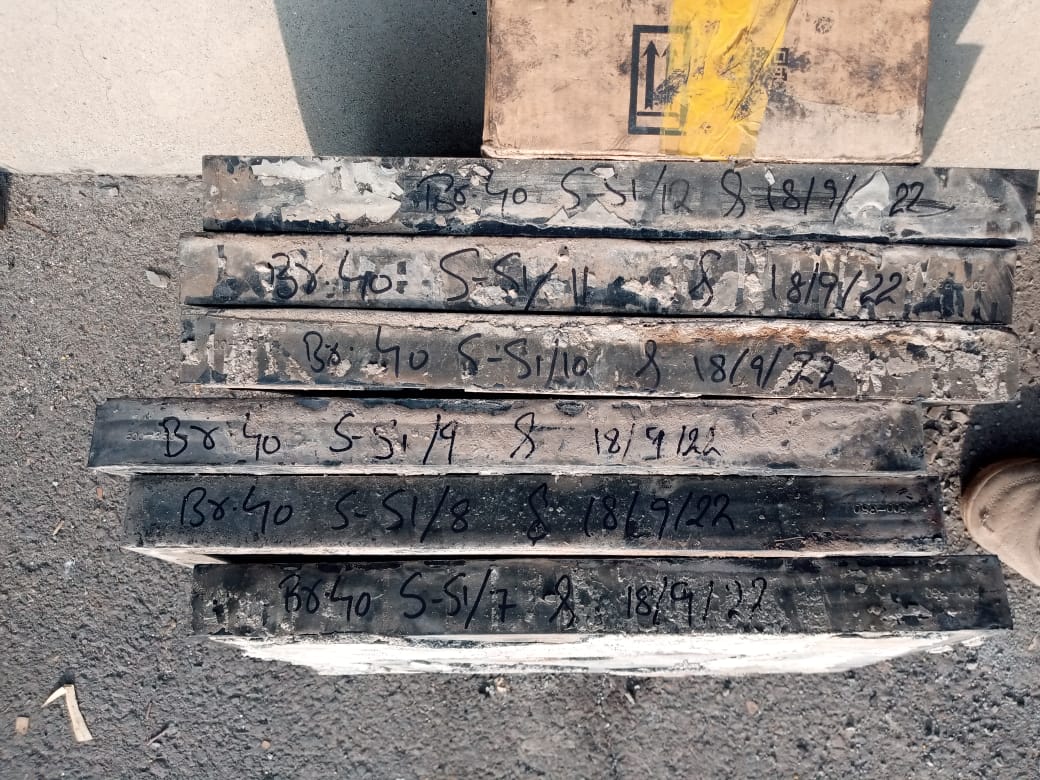 Removed elastomeric bearing pads, labelled for records